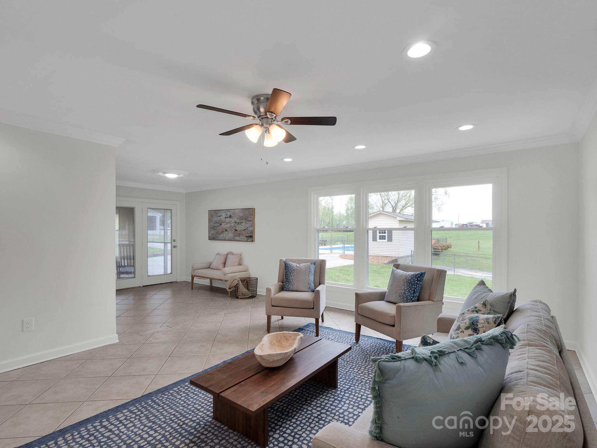 3452 Flat Creek Road Lancaster, SC 29720 - Photo 12 of 34 a living room with furniture and a large window