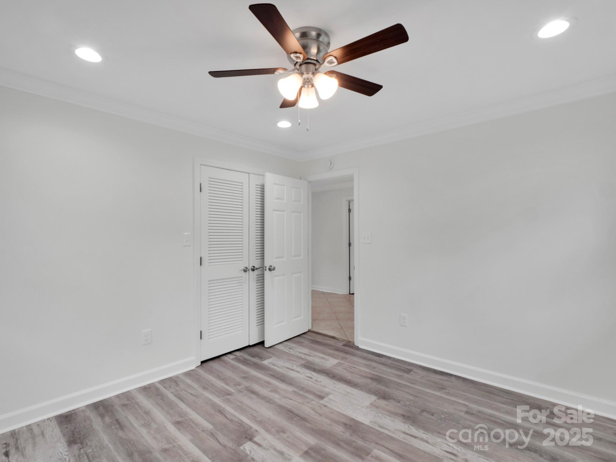 3452 Flat Creek Road Lancaster, SC 29720 - Photo 20 of 34 an empty room with closet and windows