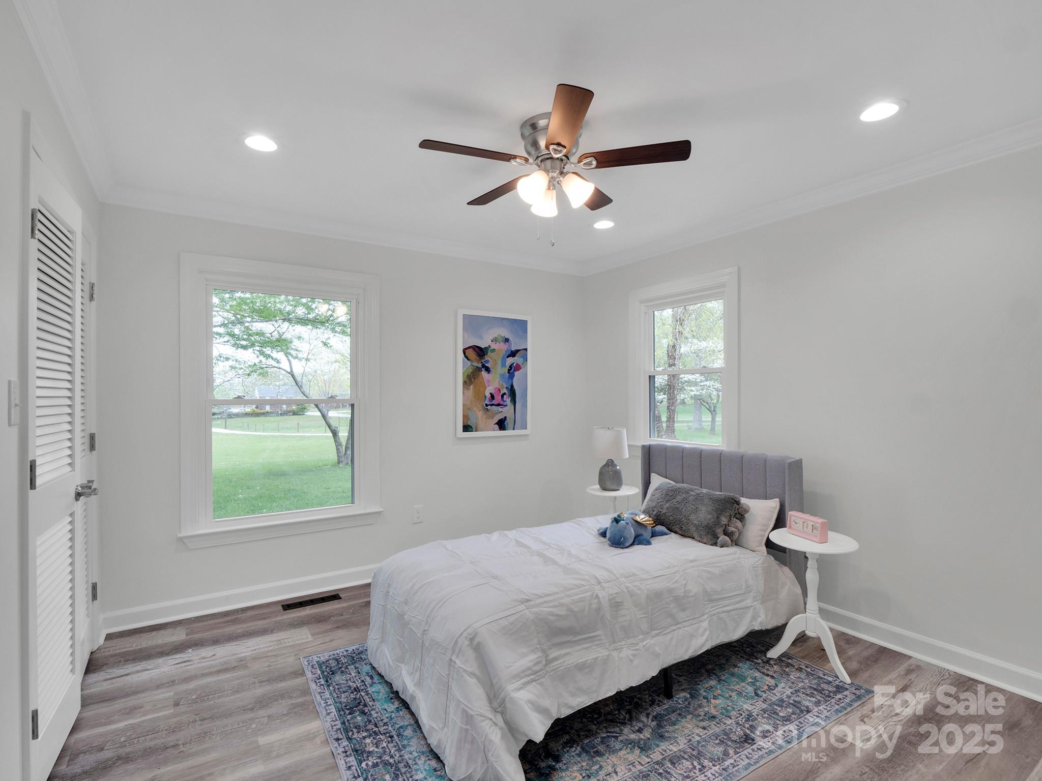 3452 Flat Creek Road Lancaster, SC 29720 - Photo 22 of 34 a bedroom with a bed and a window