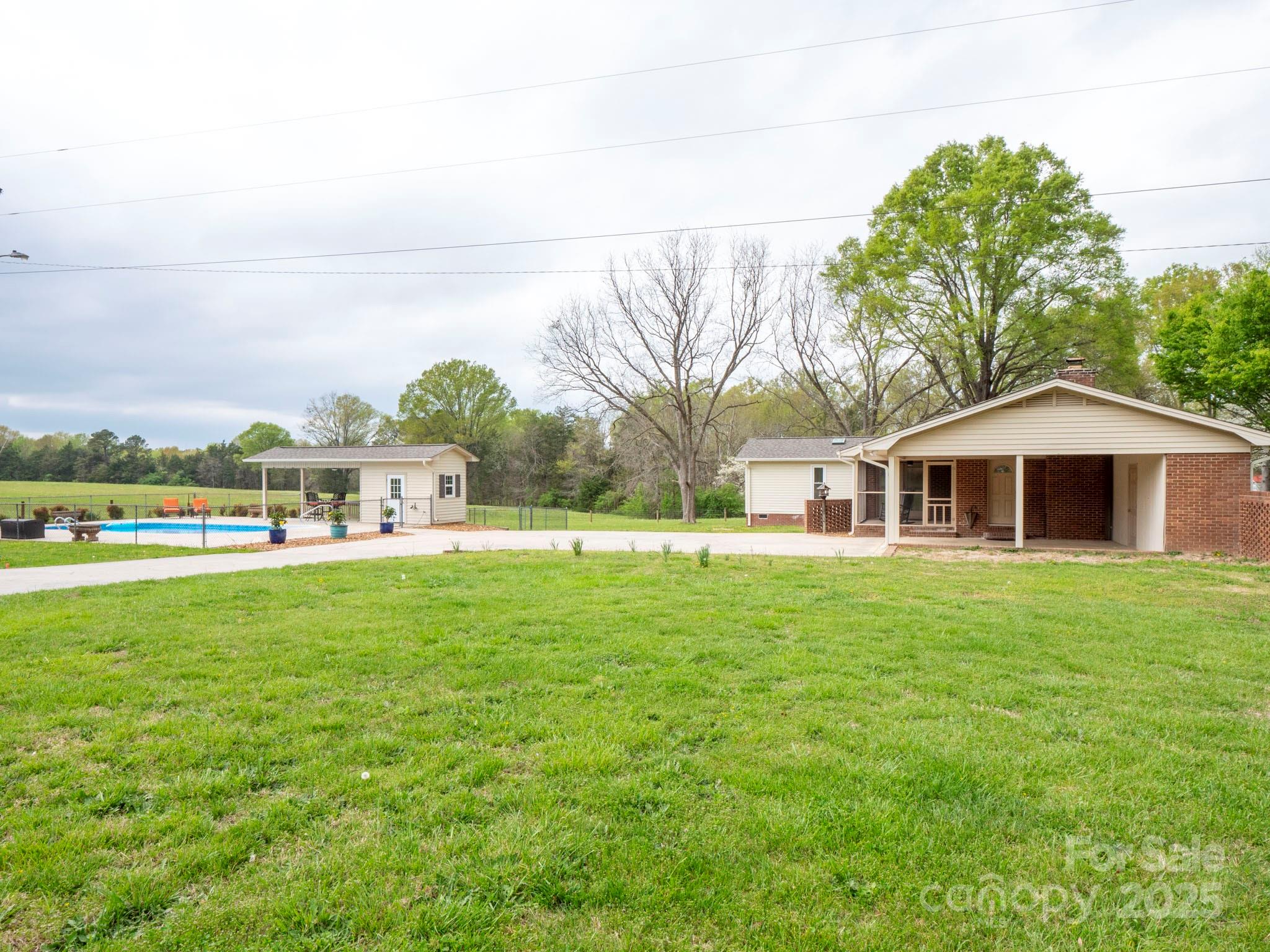 3452 Flat Creek Road Lancaster, SC 29720 - Photo 26 of 34 a front view of a house with garden