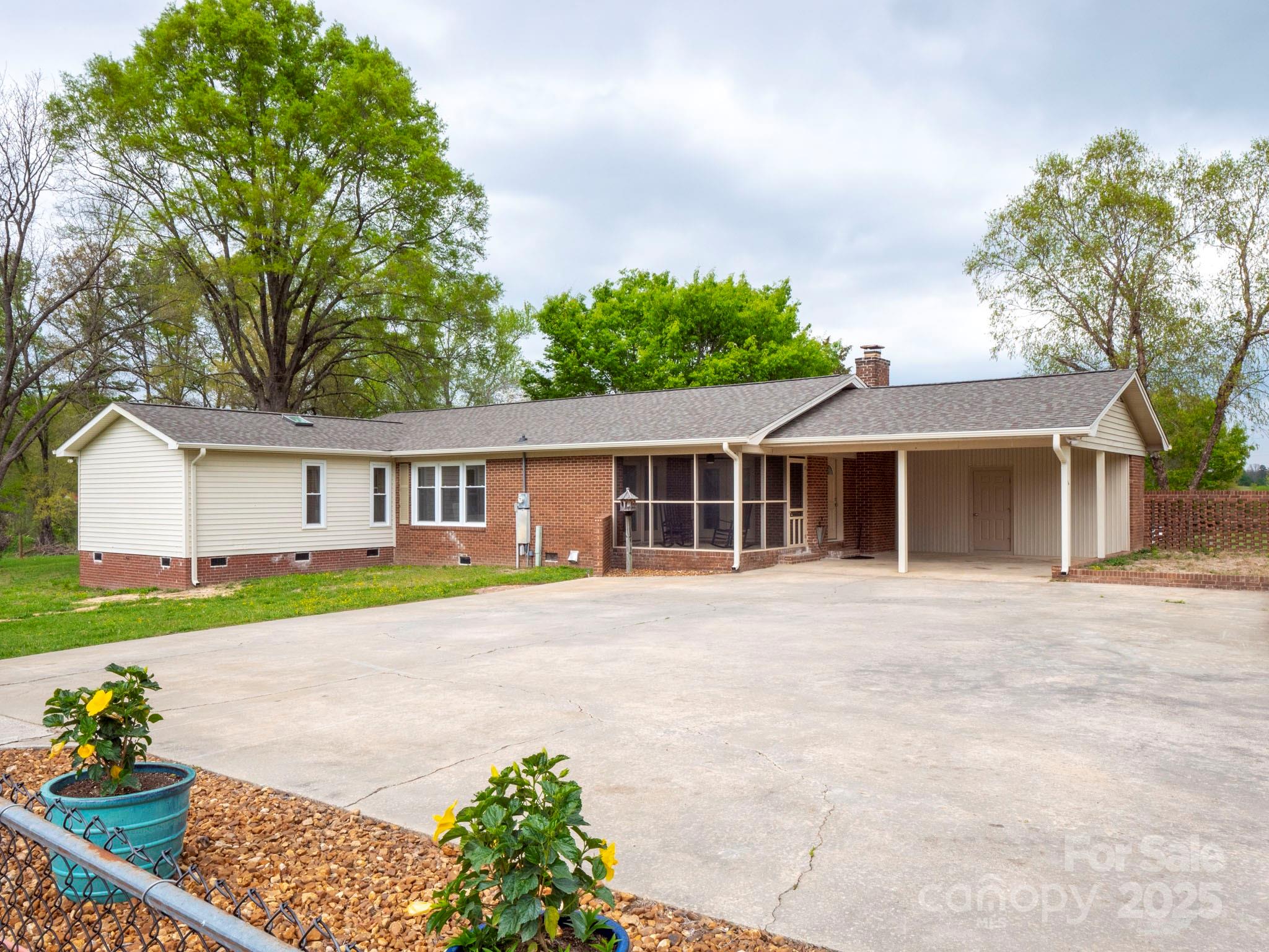 3452 Flat Creek Road Lancaster, SC 29720 - Photo 27 of 34 a front view of a house with garden