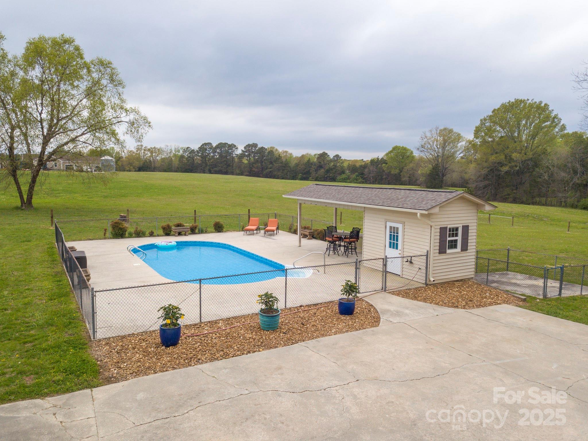 3452 Flat Creek Road Lancaster, SC 29720 - Photo 30 of 34 a view of a house with a yard and sitting area