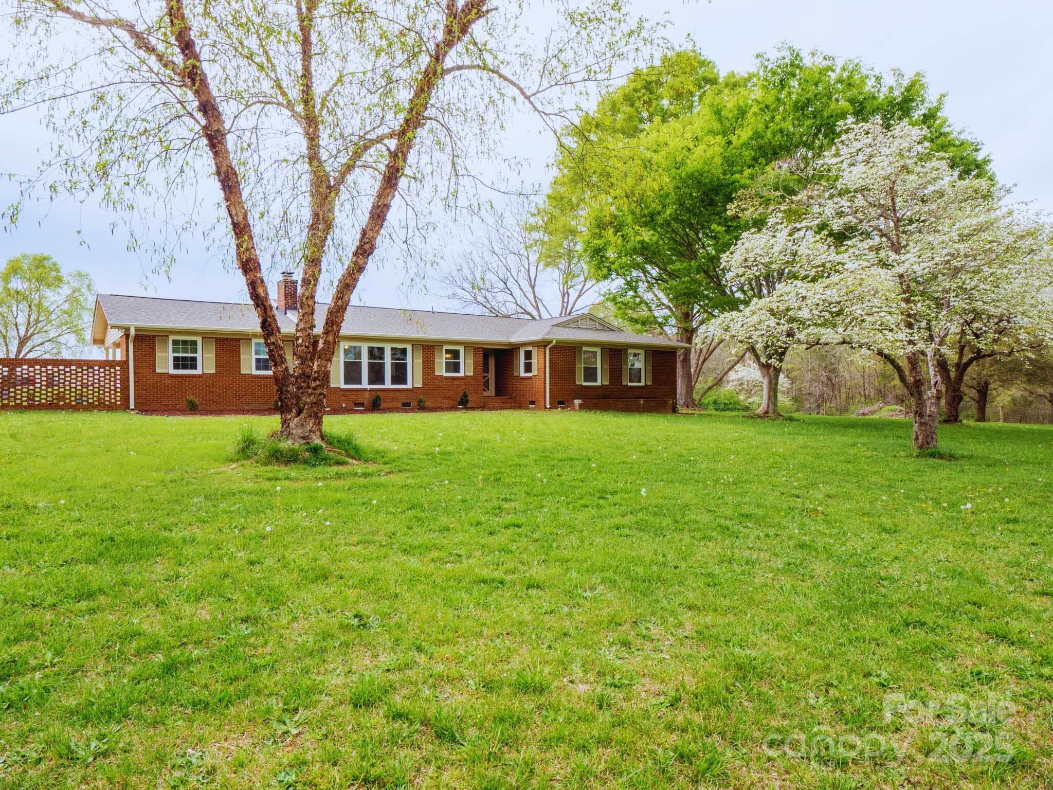 3452 Flat Creek Road Lancaster, SC 29720 - Photo 3 of 34 front view of house with a yard