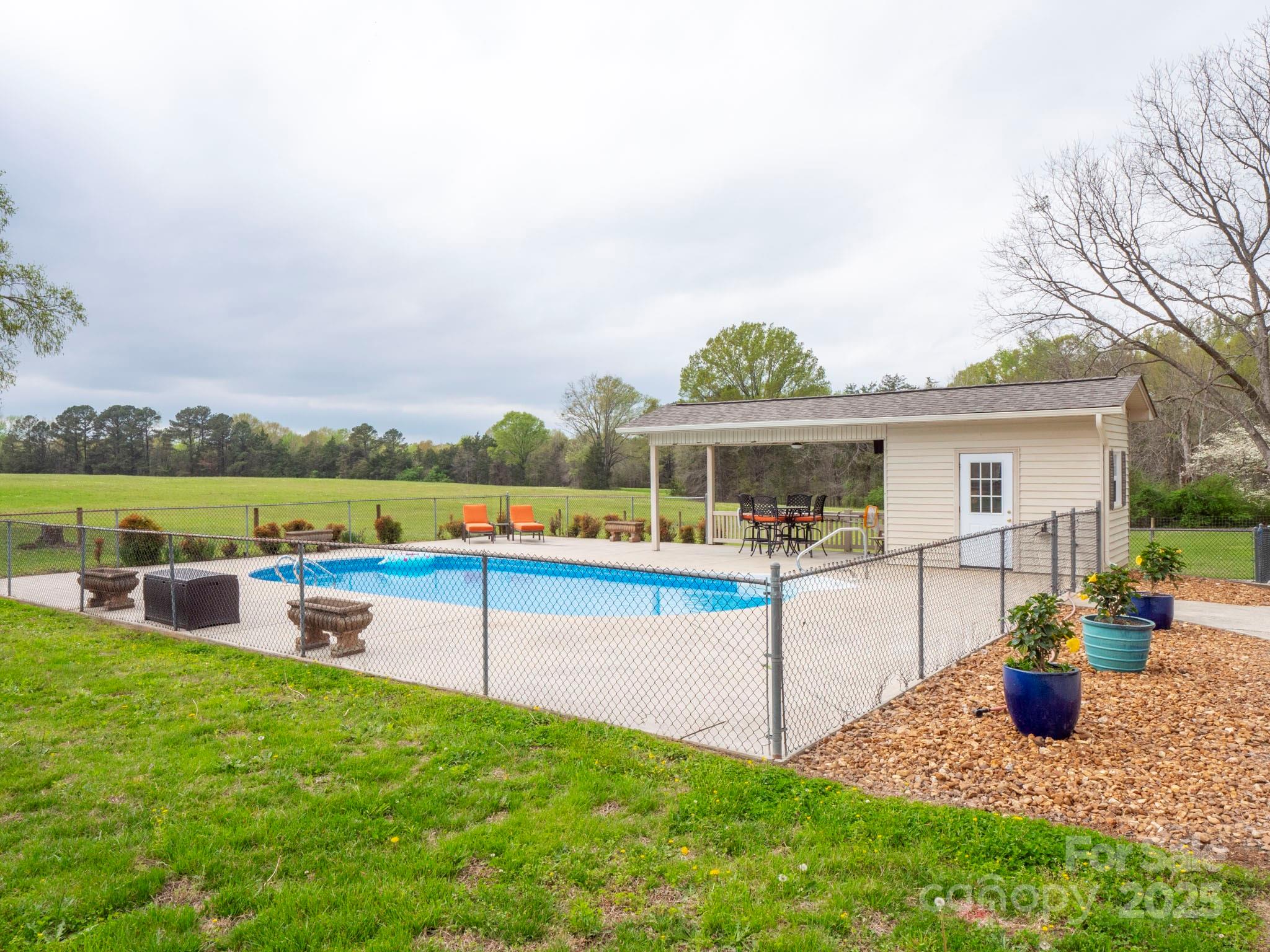 3452 Flat Creek Road Lancaster, SC 29720 - Photo 31 of 34 a view of a house with a big yard and a large tree