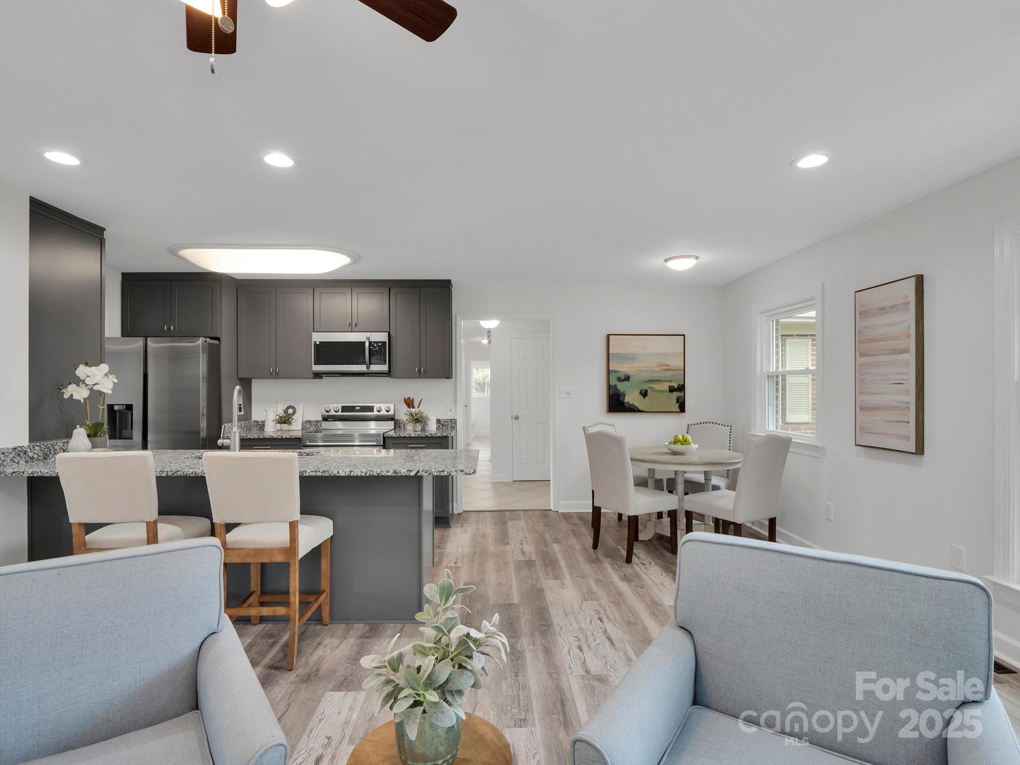 3452 Flat Creek Road Lancaster, SC 29720 - Photo 7 of 34 a living room with furniture and view of kitchen