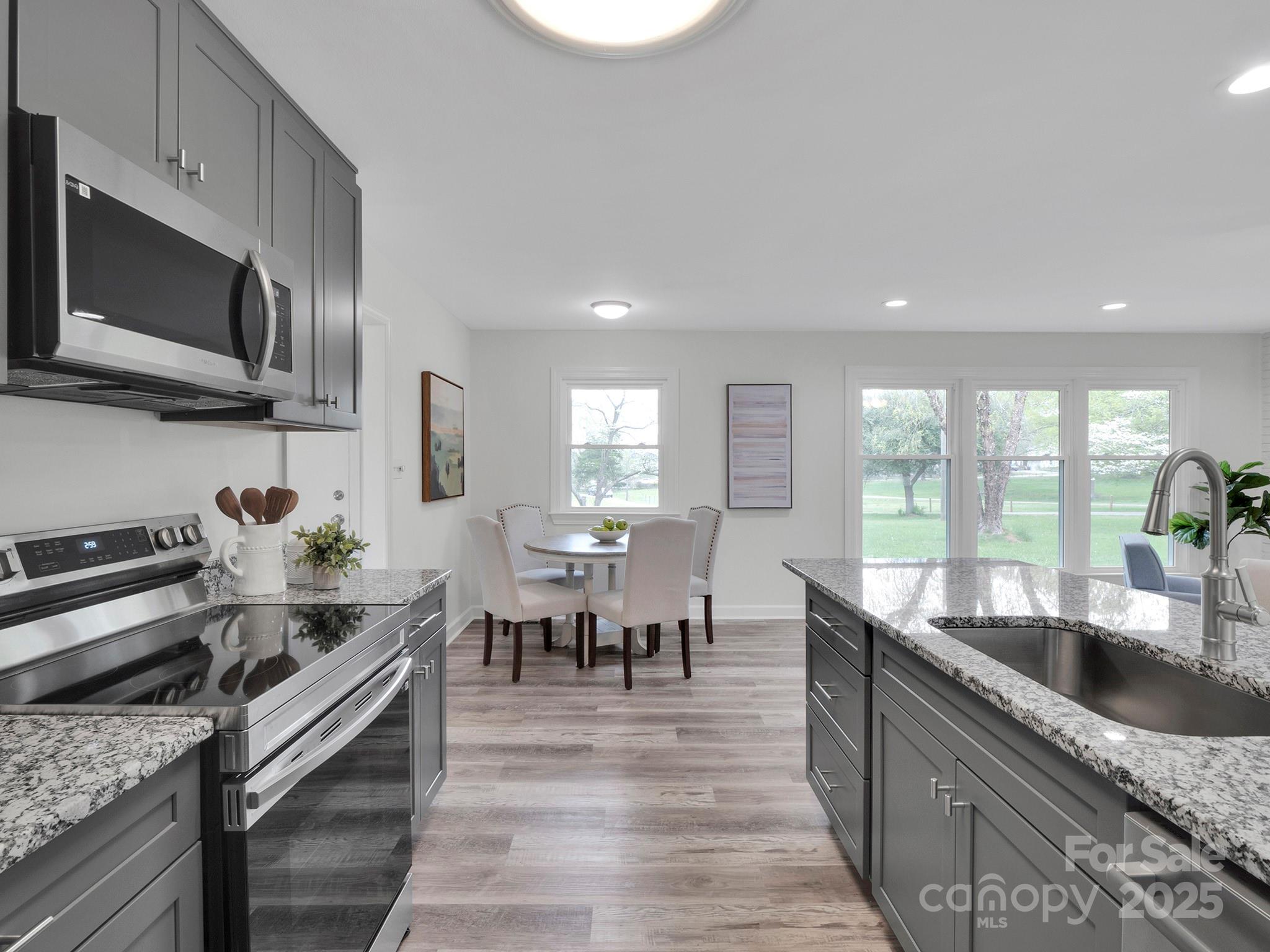 3452 Flat Creek Road Lancaster, SC 29720 - Photo 8 of 34 a kitchen with granite countertop lots of counter top space