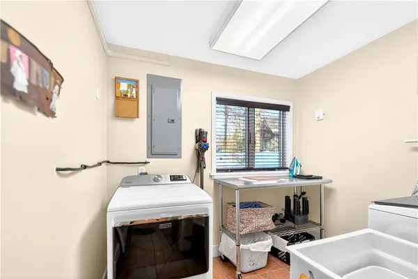 a kitchen with a stove and a sink