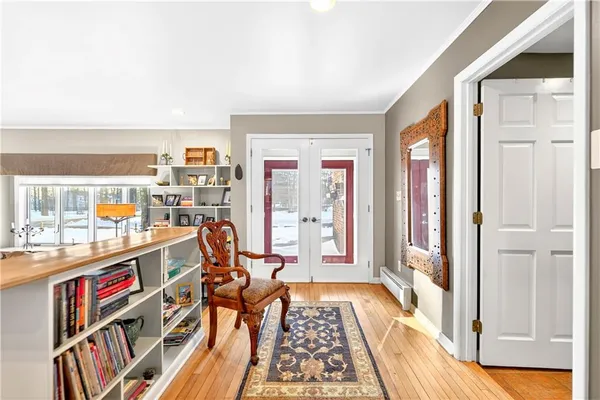 a room with furniture and a book shelf
