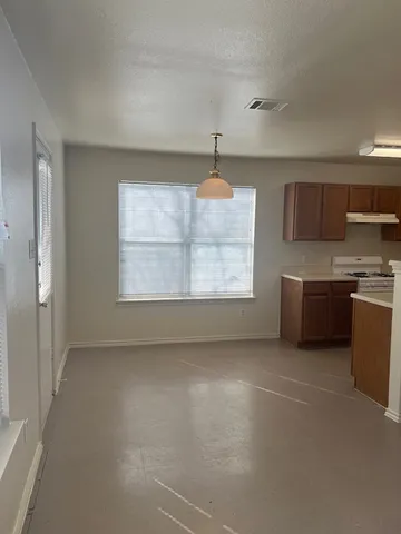 a utility room with washer and dryer