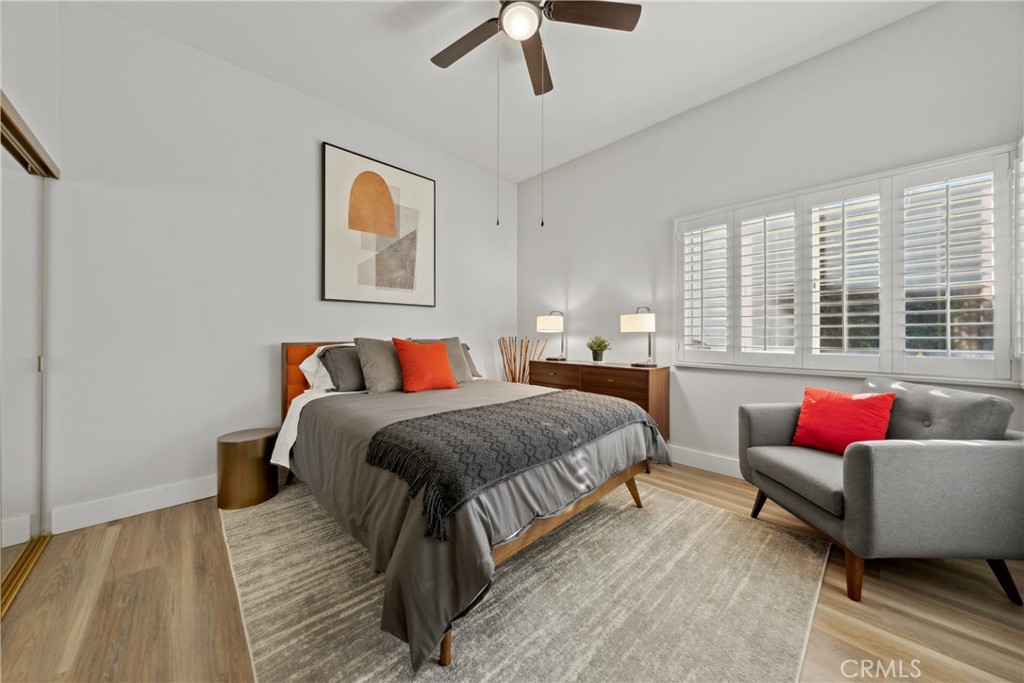 46 Pebble Beach Drive Rancho Mirage, CA 92270 - Photo 16 of 29 a spacious bedroom with a bed and a couch