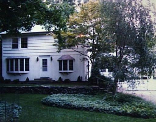 280 Cedar Road Fairfield, CT 06824 - Photo 1 of 1 a house view with a sitting space and garden