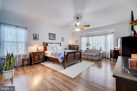 a white bath tub sitting in a bathroom