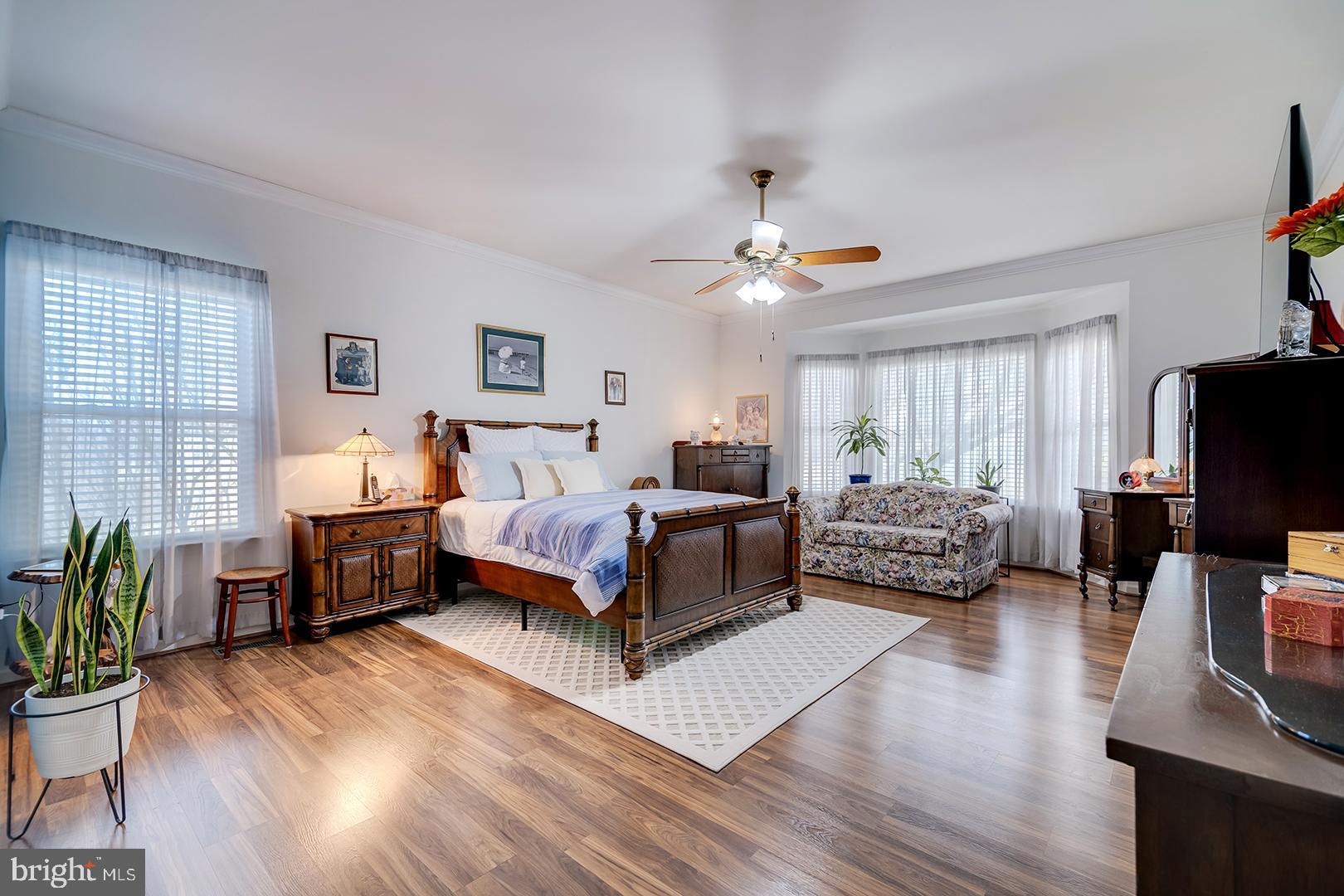 2 Michigan State Drive Newark, DE 19713 - Photo 23 of 65 a spacious bedroom with a bed and a flat screen television