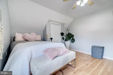 an aerial view of a houses with a swimming pool