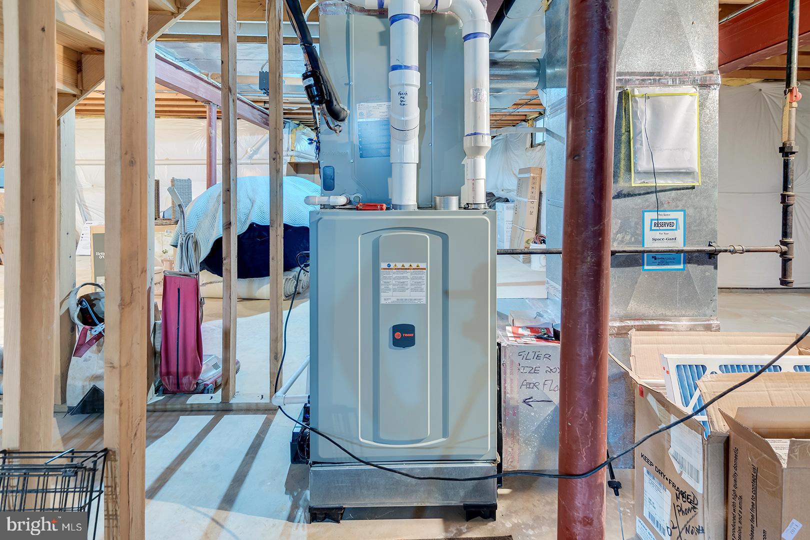 2 Michigan State Drive Newark, DE 19713 - Photo 55 of 65 a view of walk in closet with clothes and shoes