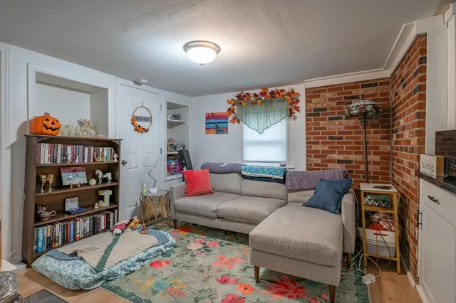 a living room with furniture workspace and a couch