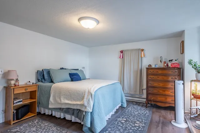 a bedroom with a bed and a closet