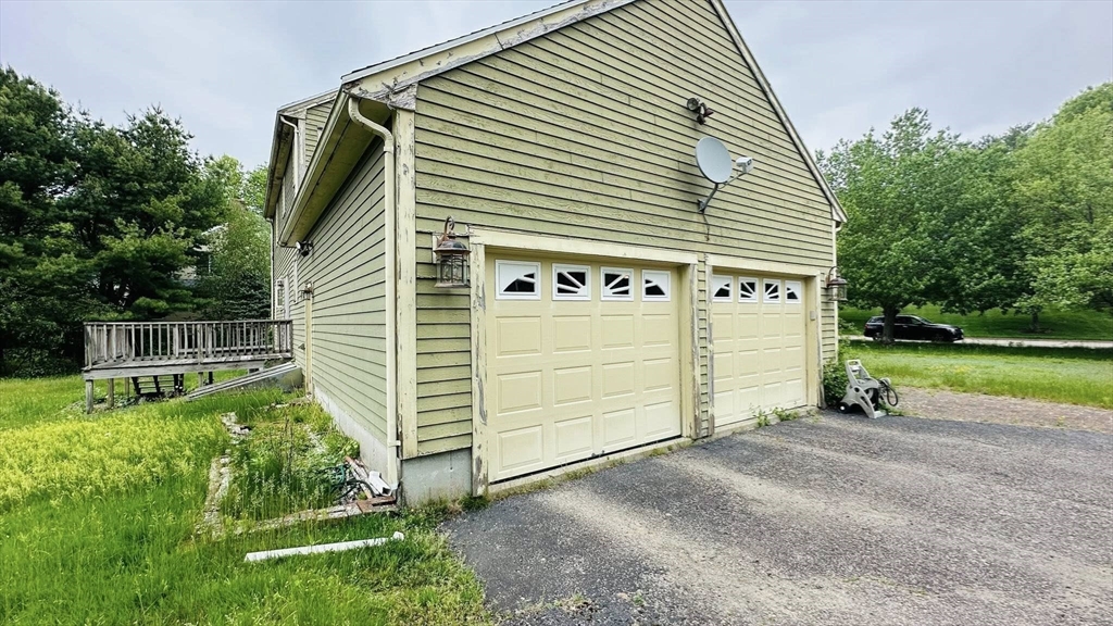 4 Canoe River Road Easton, MA 02375 - Photo 5 of 9 a front view of a house with a yard