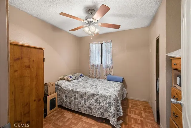 a work room with furniture and a chandelier