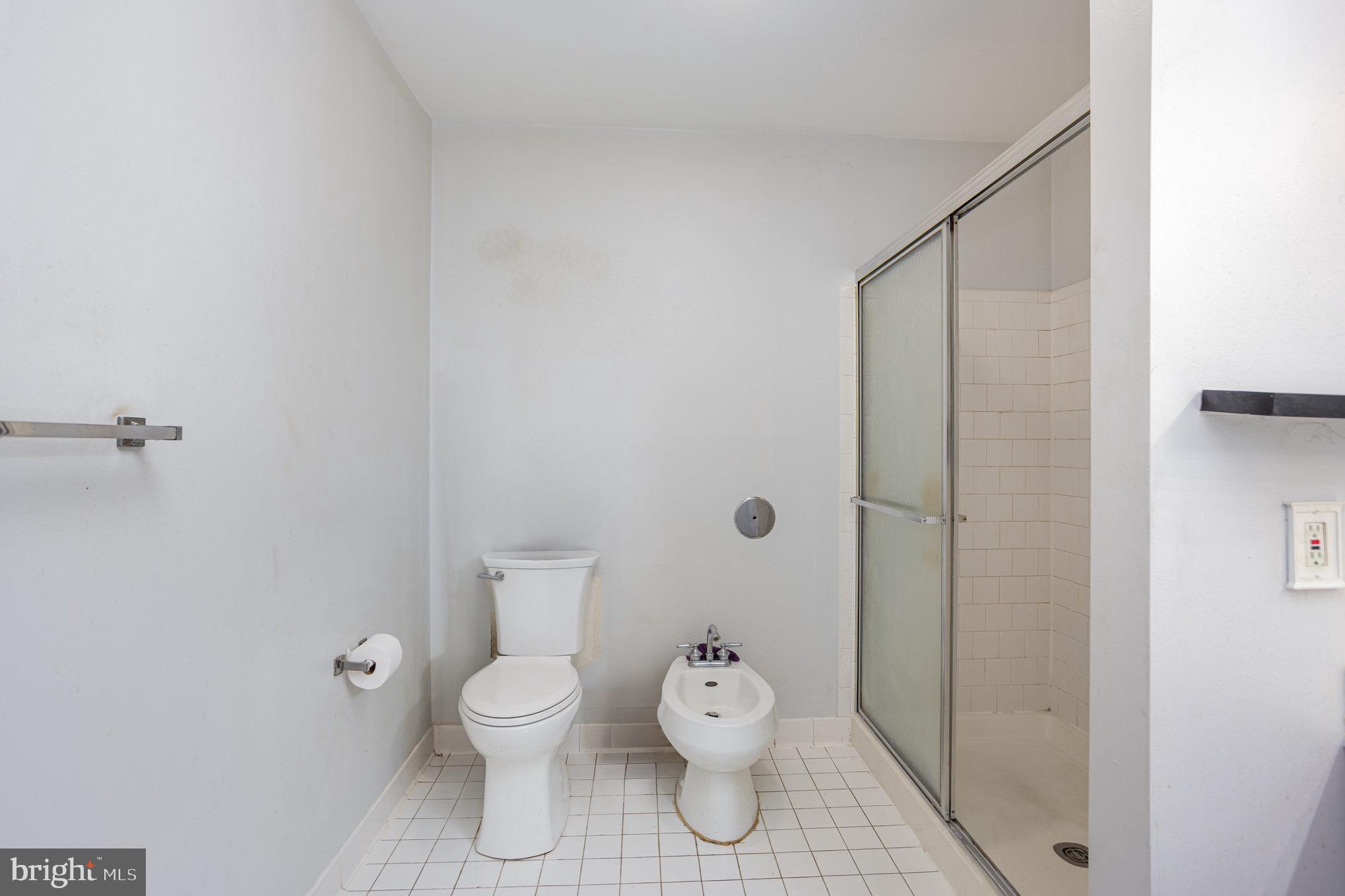 3905 Darleigh Road, Unit F Nottingham, MD 21236 - Photo 20 of 33 a white toilet sitting next to a bathroom sink