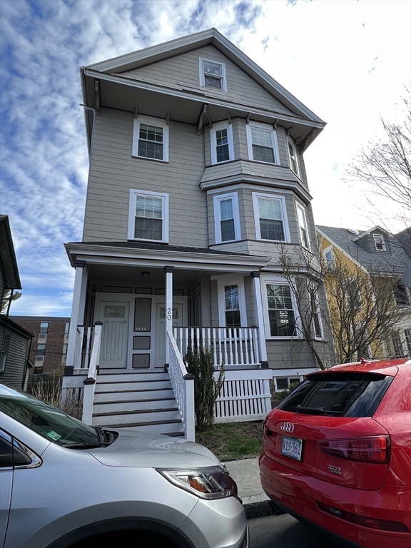 20 Kenton Road, Unit 2 Boston, MA 02130 - Photo 11 of 20 a front view of a house with a garden