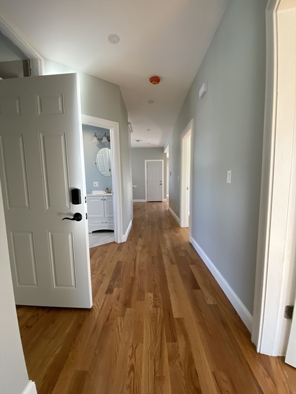 20 Kenton Road, Unit 2 Boston, MA 02130 - Photo 19 of 20 a view of hallway with wooden floor