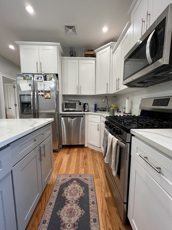 20 Kenton Road, Unit 2 Boston, MA 02130 - Photo 2 of 20 a view of a kitchen with electric appliances