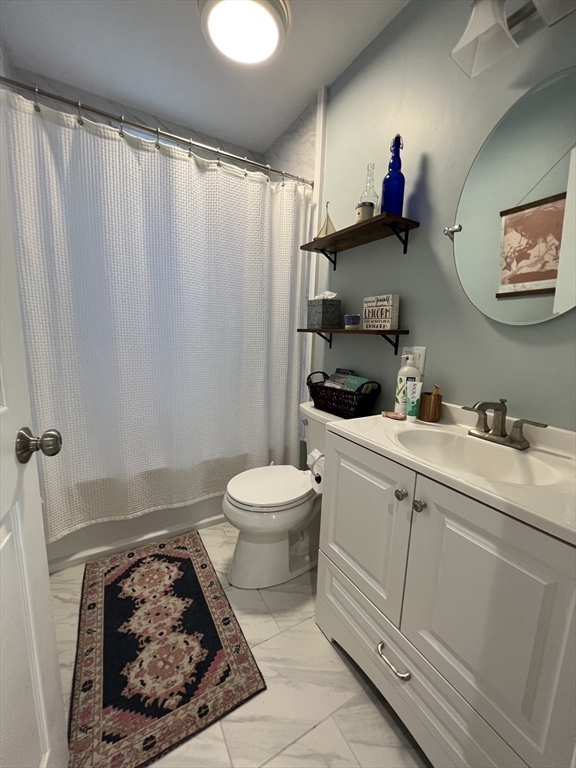 20 Kenton Road, Unit 2 Boston, MA 02130 - Photo 6 of 20 a bathroom with a sink a toilet and a shower