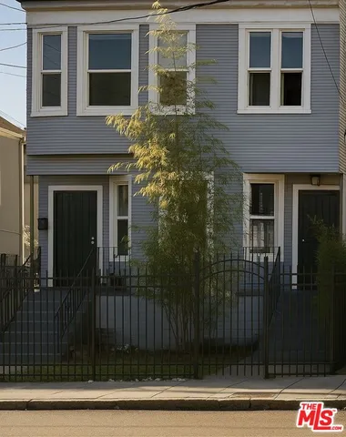 a view of a house with a glass door