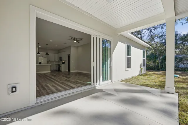 a view of a porch with a backyard