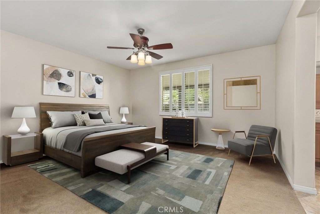 30355 Lamplighter Lane Menifee, CA 92584 - Photo 11 of 31 a spacious bedroom with a bed and a window