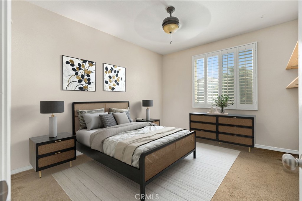 30355 Lamplighter Lane Menifee, CA 92584 - Photo 18 of 31 a bed room with a bed and a window