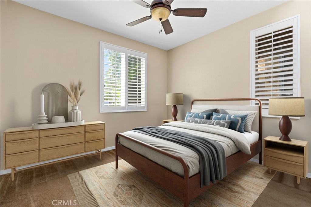 30355 Lamplighter Lane Menifee, CA 92584 - Photo 19 of 31 a bedroom with a bed and a window