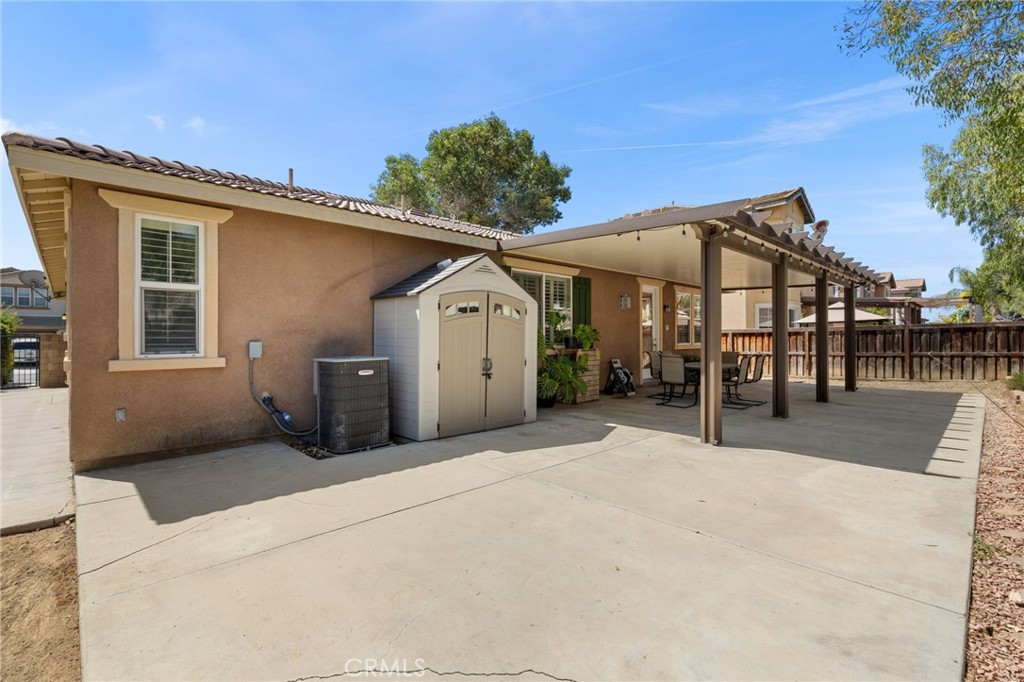 30355 Lamplighter Lane Menifee, CA 92584 - Photo 22 of 31 a view of a house with a patio