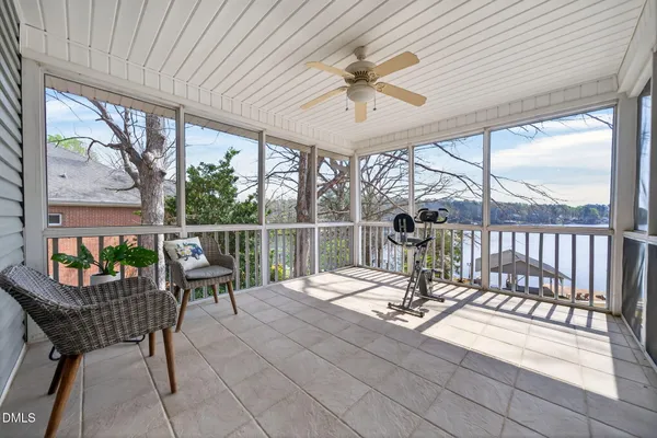 a view of a patio with a dining table and chairs