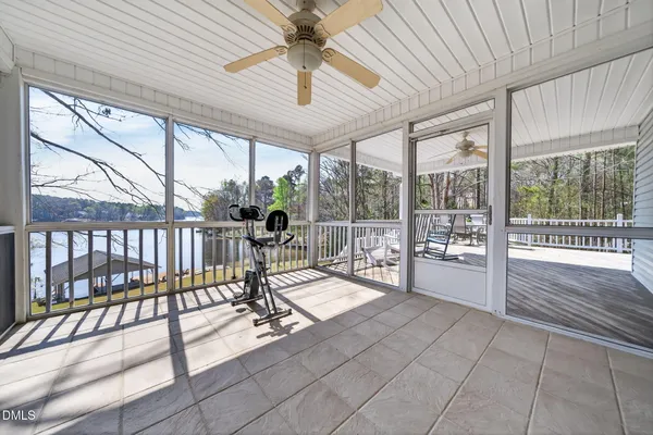 a view of a living room and floor to ceiling window