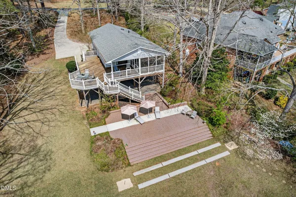 an aerial view of a house with swimming pool