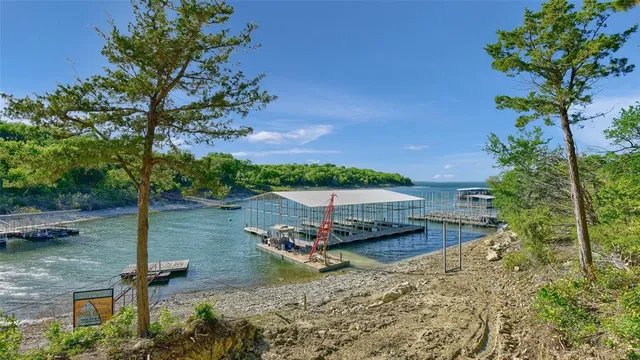 a view of a swimming pool with a yard