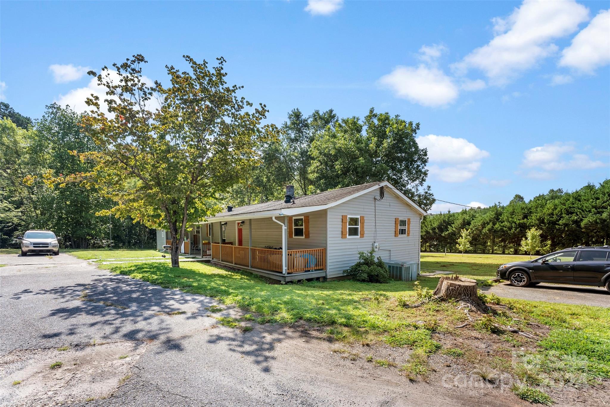 1148 Wagon Wheel Road Hickory, NC 28602 - Photo 13 of 35 a view of a house with a yard and fence