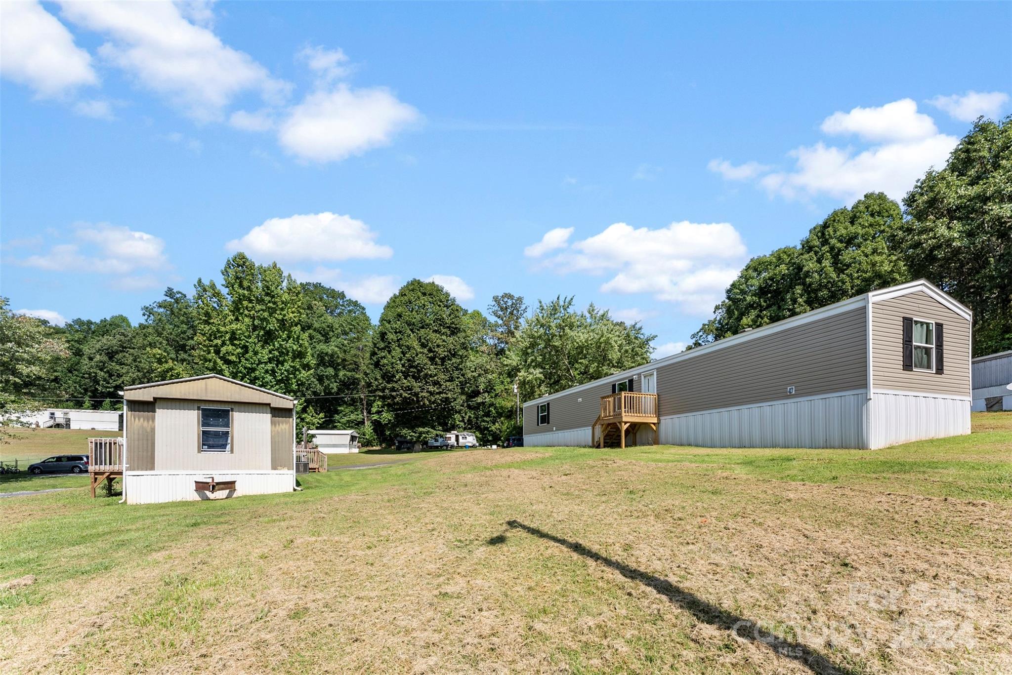 1148 Wagon Wheel Road Hickory, NC 28602 - Photo 23 of 35 a front view of a house with a yard