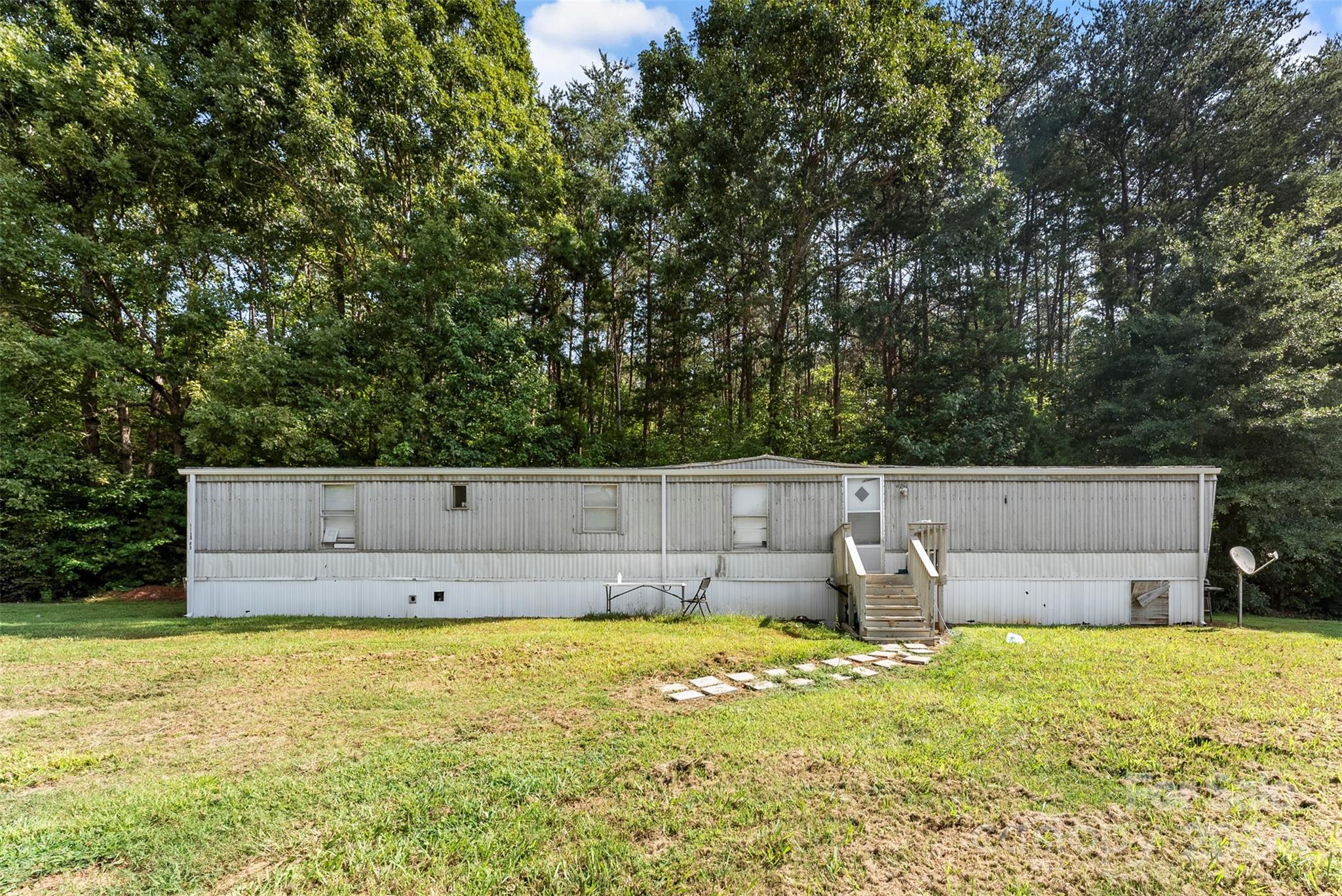 1148 Wagon Wheel Road Hickory, NC 28602 - Photo 26 of 35 a view of a swimming pool and deck