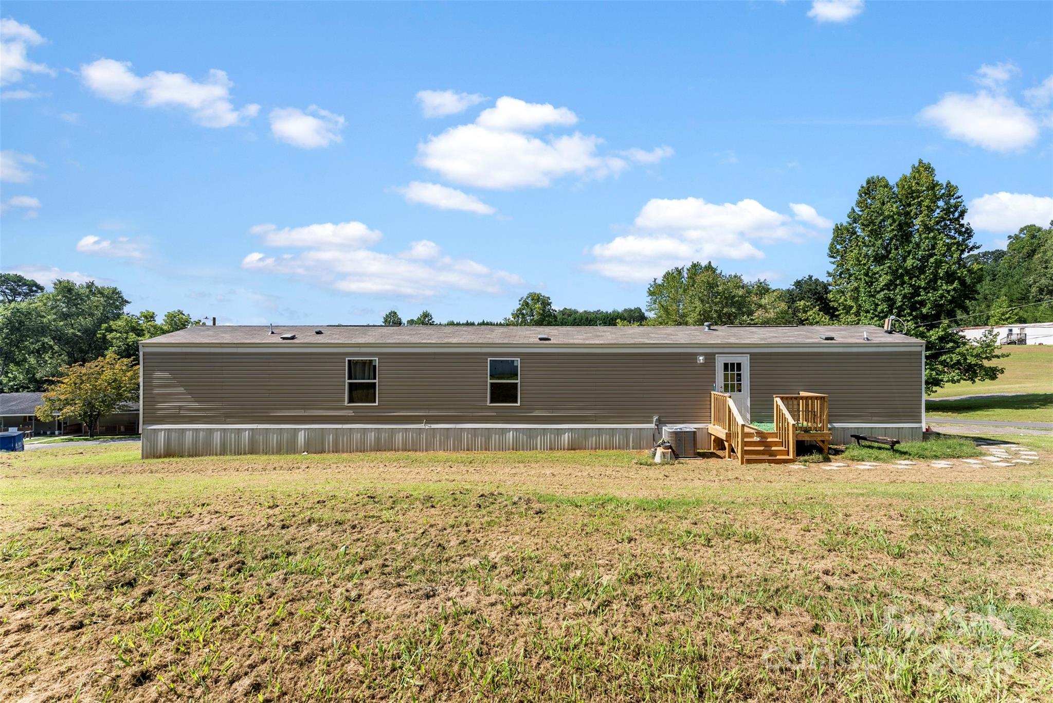 1148 Wagon Wheel Road Hickory, NC 28602 - Photo 27 of 35 a view of pool with lawn chairs