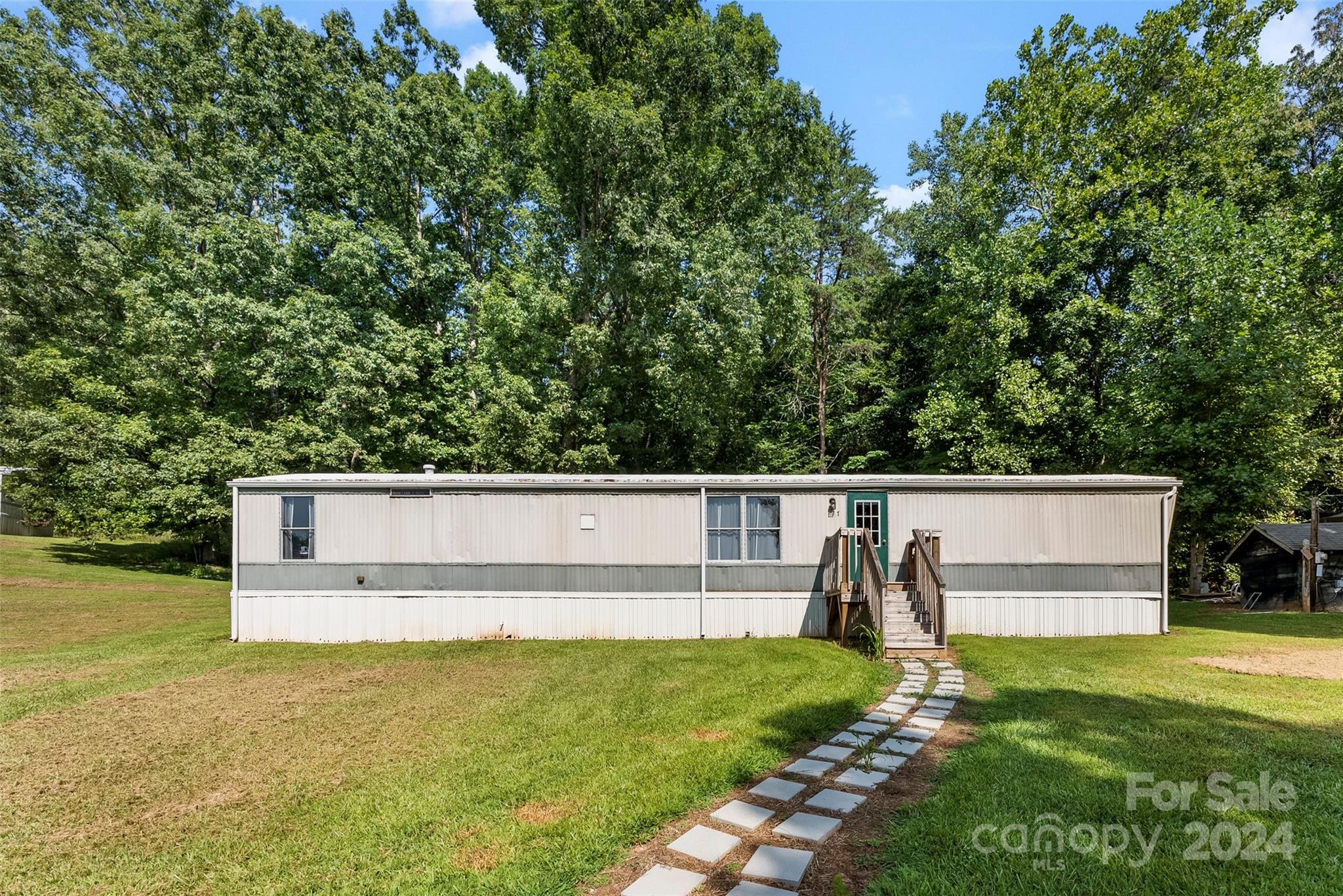 1148 Wagon Wheel Road Hickory, NC 28602 - Photo 30 of 35 a view of a swimming pool with a patio