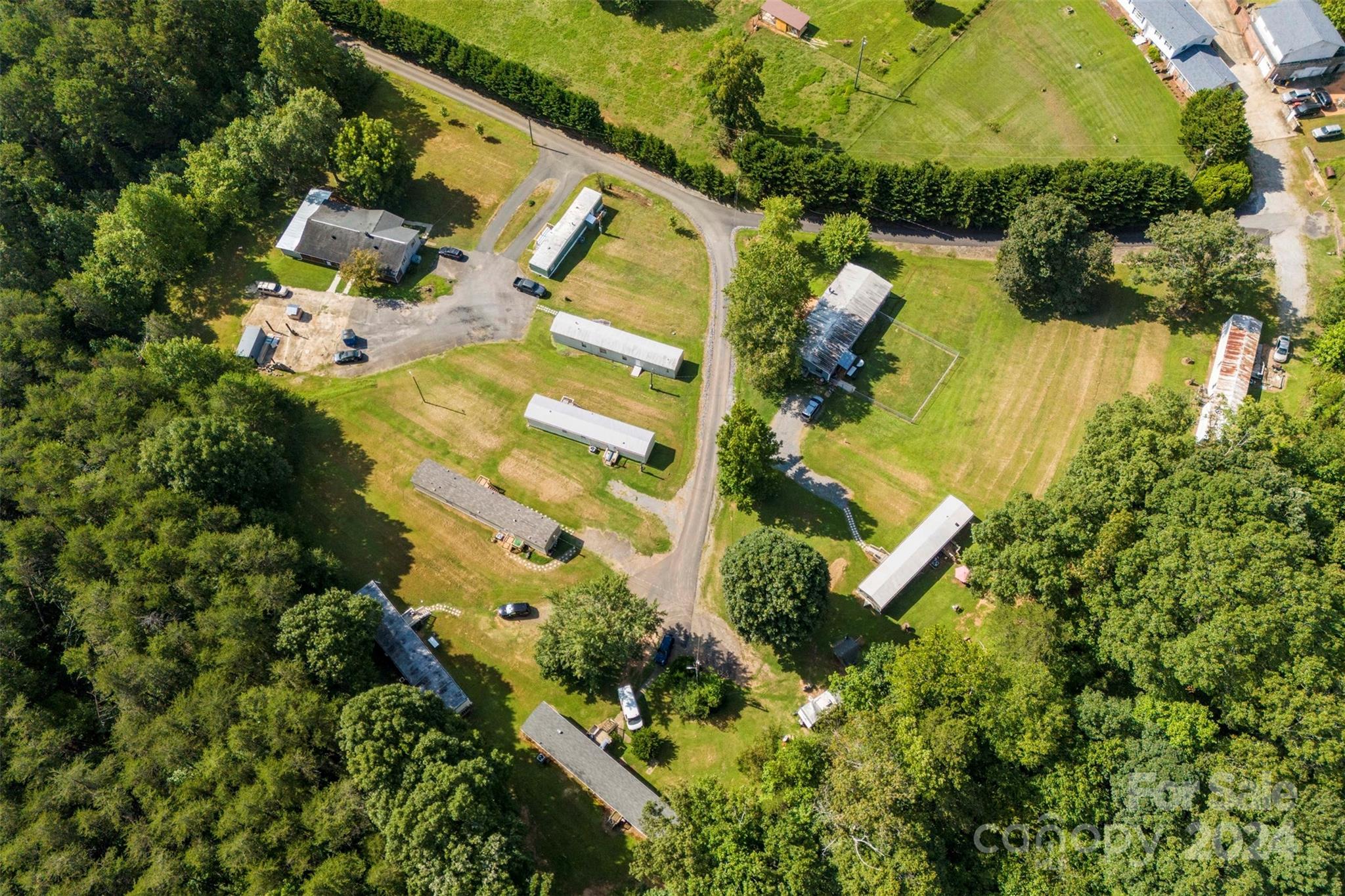 1148 Wagon Wheel Road Hickory, NC 28602 - Photo 6 of 35 an aerial view of residential house with pool and garden