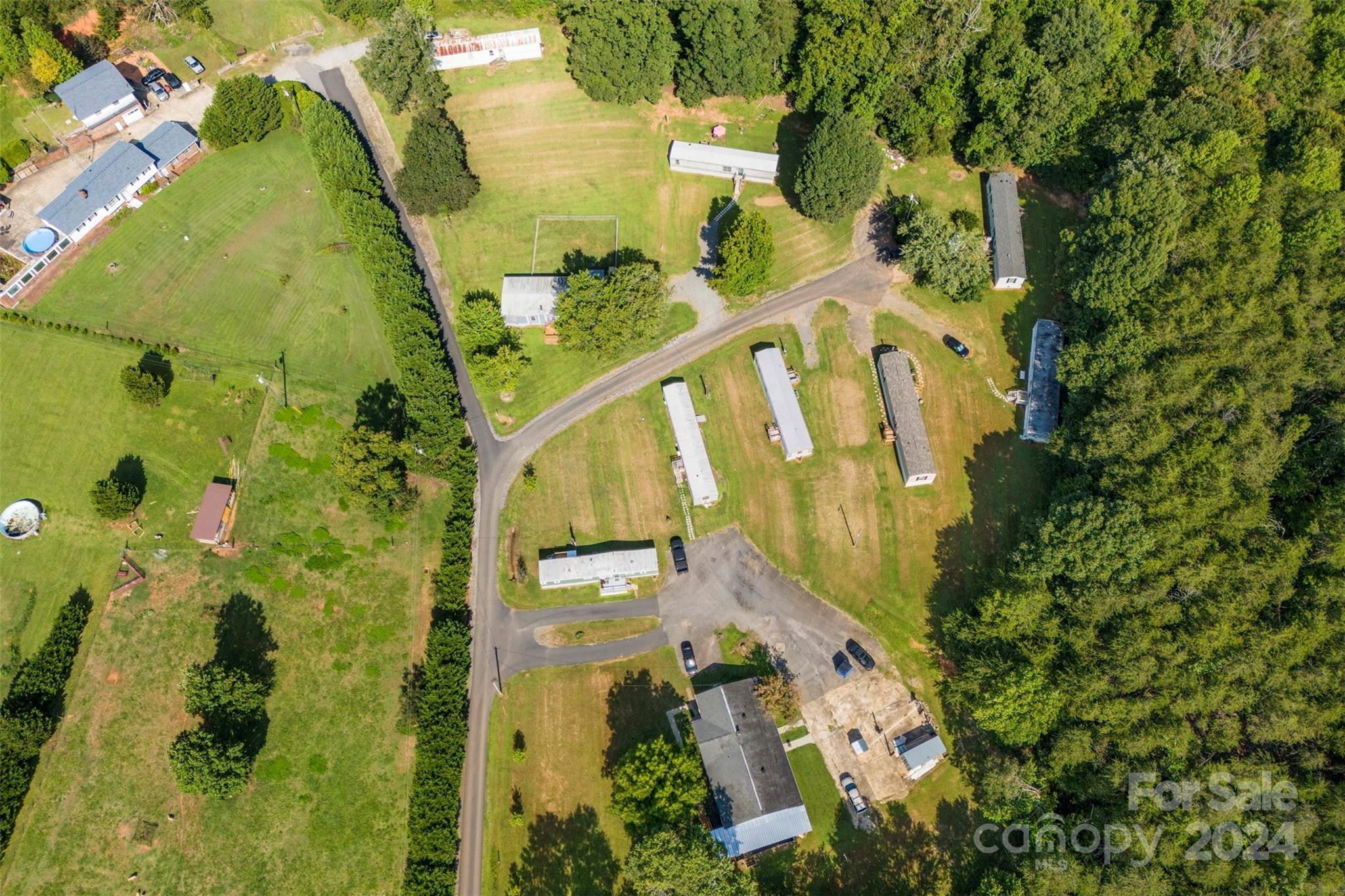 1148 Wagon Wheel Road Hickory, NC 28602 - Photo 9 of 35 a view of a house with a garden