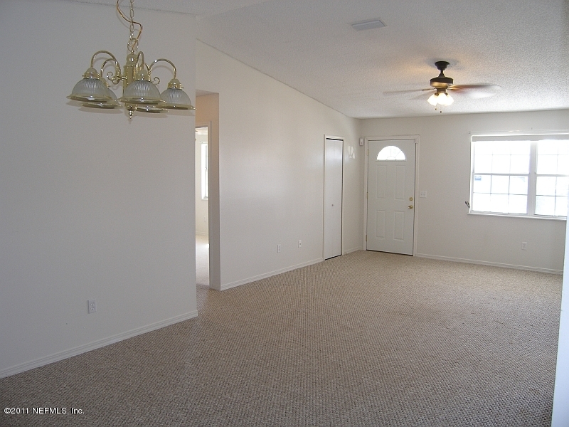 2211 Mareeba Road East Jacksonville, FL 32246 - Photo 2 of 10 Living and Dining Room