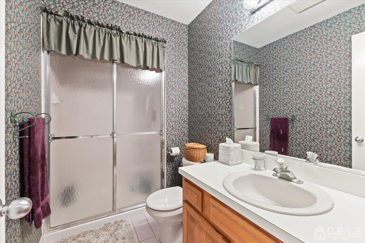 18 Lance Road Lebanon, NJ 08833 - Photo 17 of 45 a bathroom with a sink toilet and shower