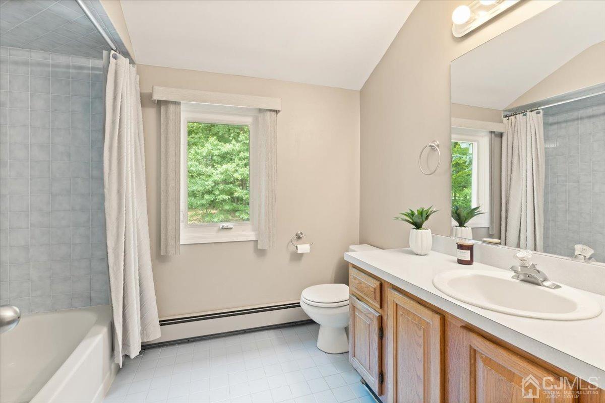 18 Lance Road Lebanon, NJ 08833 - Photo 25 of 45 a bathroom with a double vanity sink toilet and shower