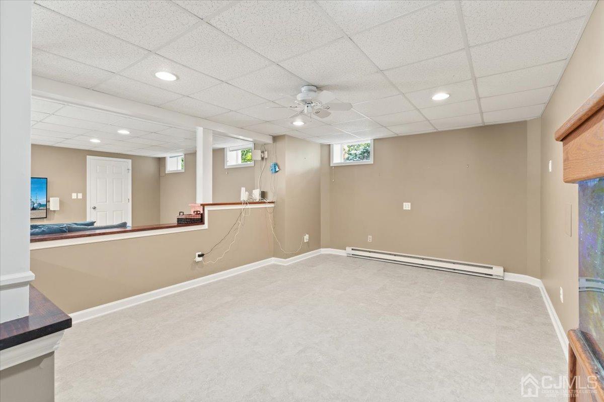 18 Lance Road Lebanon, NJ 08833 - Photo 28 of 45 an empty room with kitchen and windows