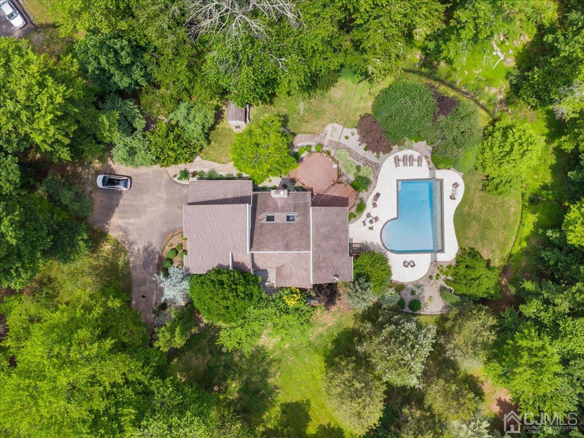18 Lance Road Lebanon, NJ 08833 - Photo 36 of 45 an aerial view of a house with a yard and trees all around